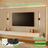 Modern living room with wall lights and a TV, featuring text about large capacity wall lights and battery information.